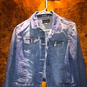 A fitted dark wash jean jacket